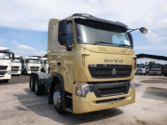 Truk dump dengan kapasitas beban 21-30 ton dan truk traktor bekas