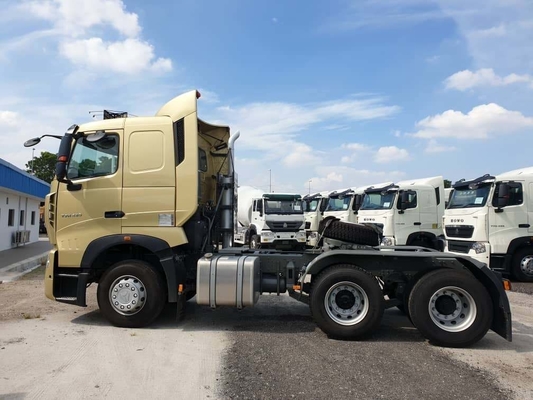 Truk dump dengan kapasitas beban 21-30 ton dan truk traktor bekas